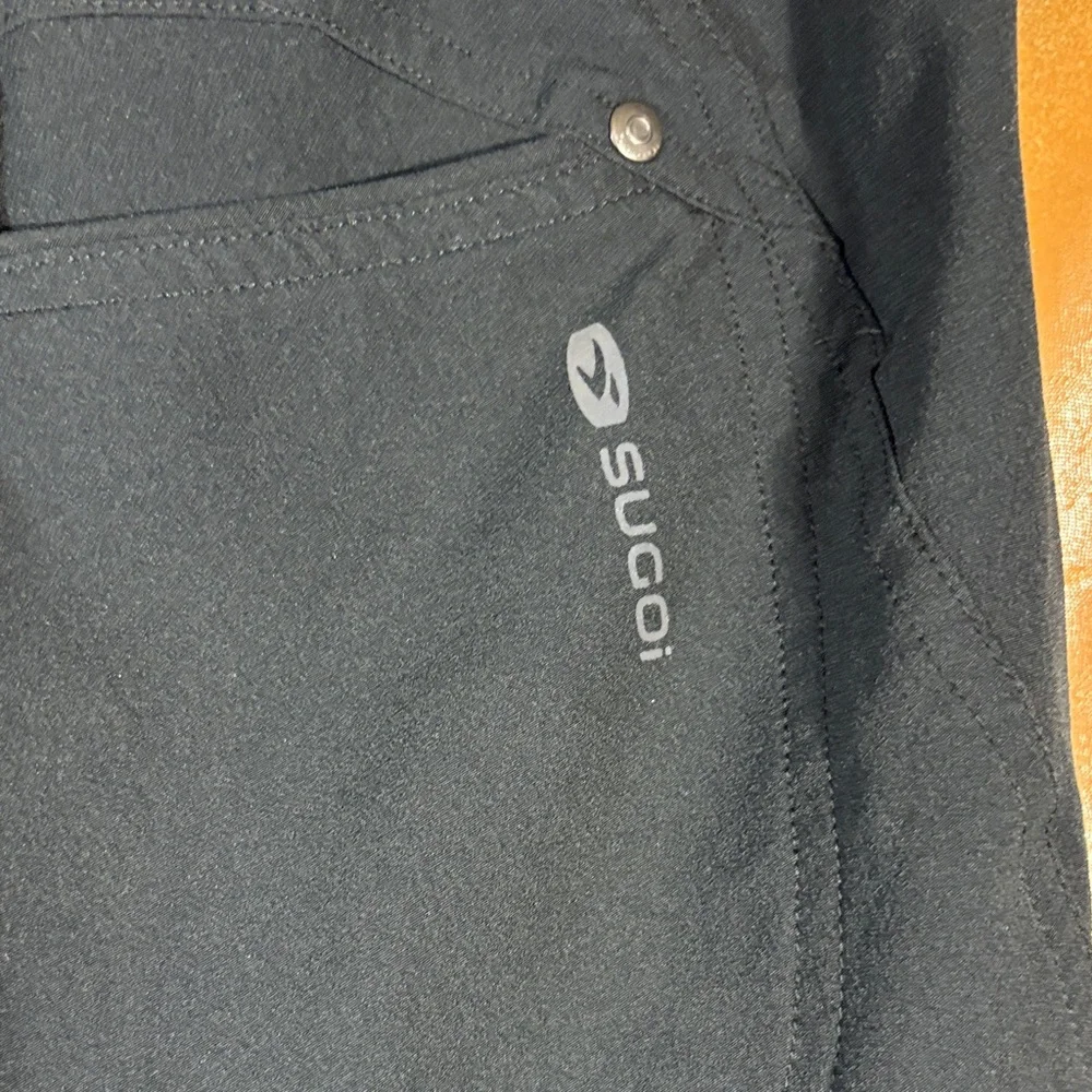 Unisex Sugoi‎ stretch Black Shorts. Swim trunks? 26” waist. Box kk